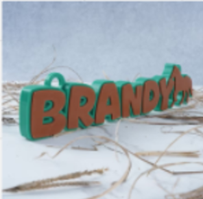 Two-colour 3D-printed hanging stable sign reading Brandy
